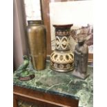 A WMF planished copper vase; a decorative Doulton Lambeth pipe fitting; a contemporary verdigris