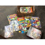 A collection of fifty-six Marvel comics including The Hulk, Spider-Man, etc; and an old tin