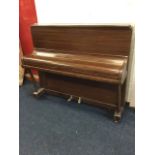 An overstrung William Thomson & Sons walnut piano with plain caddy moulded case and seven octave