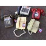 Five vintage telephones including a BT payphone with original key and coinslot, three push-button