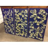 Three rectangular box canvas decoupage panels decorated with bird engravings on blue ground. (16in x