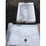 A boxed rectangular Mira shower tray - 48in x 30in; and another - 47in x 31.5in. (2)