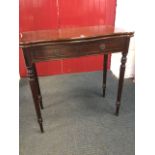 A Georgian style mahogany turn-over-top card table with rounded projecting corners, the interior