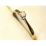 A 9ct gold solitaire diamond ring, the round claw set stone mounted on a fine tapering hallmarked