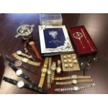Miscellaneous collectors items including a set of military buttons, fourteen modern wristwatches,