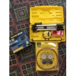 A boxed Workzone high pressure pipe cleaner; a cased Power Master tripod & laser level; and a