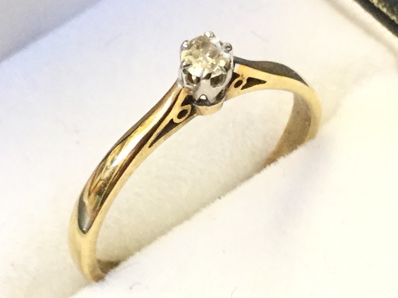 A 9ct gold solitaire diamond ring, the round claw set stone mounted on a fine tapering hallmarked - Image 3 of 3