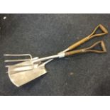 A Wilkinson matching stainless steel fork & spade with ash shafts. (2)