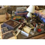 Miscellaneous items including jigsaws, clocks, a boxed wine rack, glass paperweights, a parasol, a