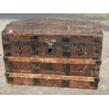 A domed top seamans trunk by Peterkin of Aberdeen, having lined and fitted interior with lidded