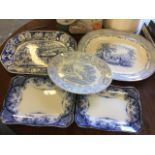 Two large nineteenth century blue & white ashets decorated with rural landscape scenes with floral