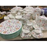 An extensive Minton Haddon Hall pattern tea and dinner service including tureens & covers, a