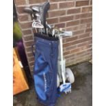 A set of Howson golf clubs in bag with trolley - 17 clubs including a Ram Demon putter, a Big Bertha