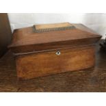 A nineteenth century rosewood tea caddy of sarcophagus form, the tablet top with ribbed beading