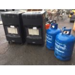 Two Campingaz heaters on casters, complete with two new full cylinders, with instructions -