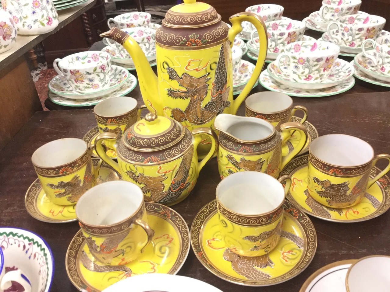 A Japanese six-piece enamelled coffee set with gilt dragons on yellow ground; and three nineteenth - Image 2 of 3