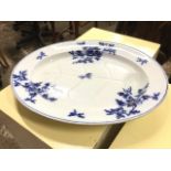 A Victorian Ashworth gravy moulded Staffordshire ashet, the oval meatplate with blue floral