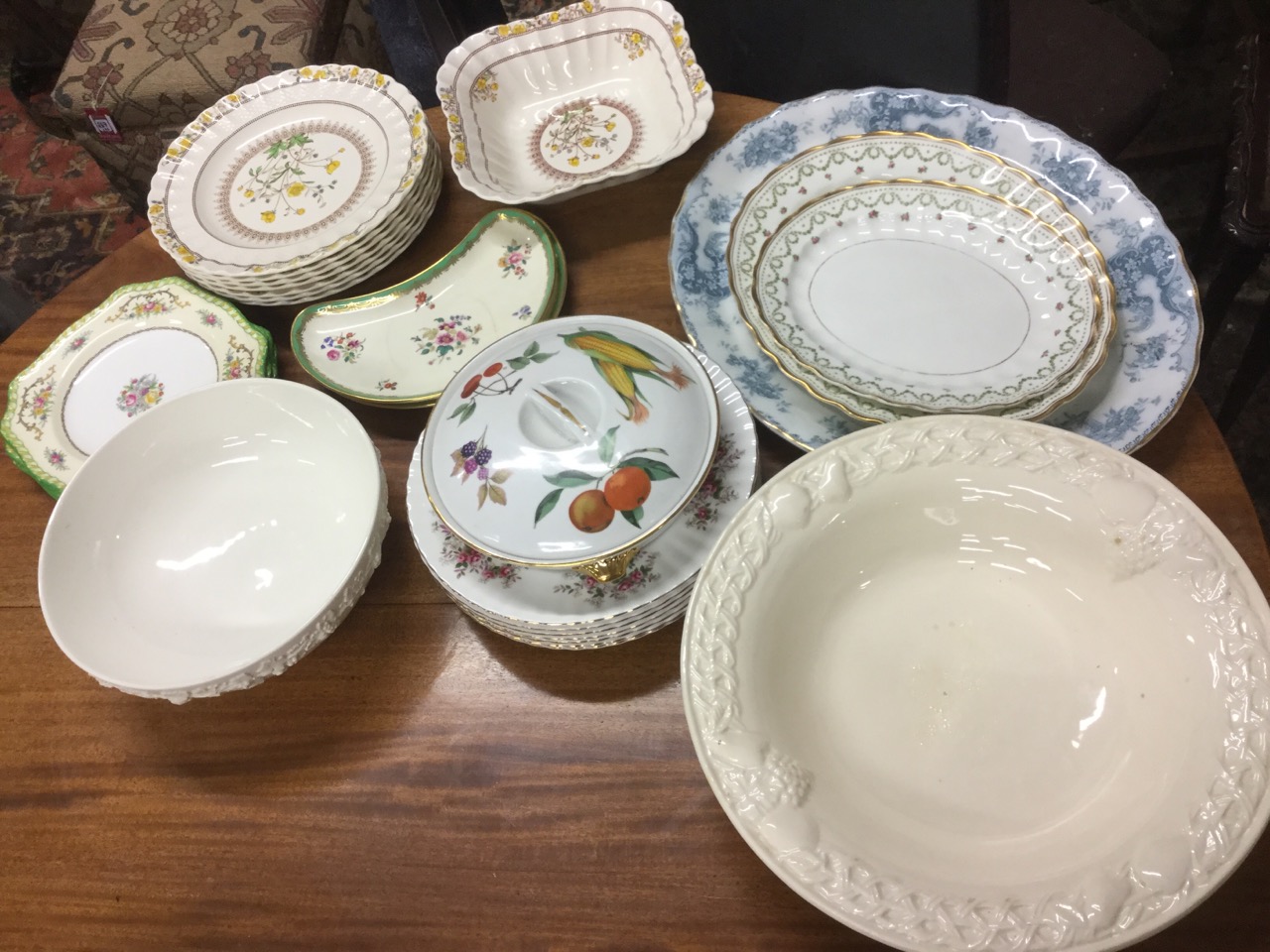 A Spode dessert set decorated in the buttercup pattern with basketweave moulded plates and serving