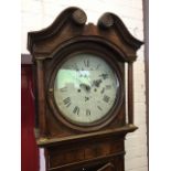 A nineteenth century oak longcase clock with circular enamelled dial and movement by Benjamin Smith,