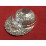 A Sterling silver caddy spoon modelled in form of a fluted jockey cap, with vacant presentational