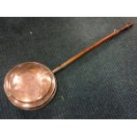 A Victorian copper bedwarming pan