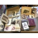 A Victorian leather bound family photograph album containing portrait photos; other loose family