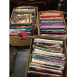 Three boxes of books - childrens, annuals, Judge Dread comics, Asterix, science fiction, etc; and