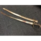 A nineteenth century sabre with channelled steel blade and pierced scrolled cage guard, the ribbed