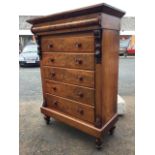 A large Victorian Scotch chest, the angled cornice with top hatch above a split column frieze, the