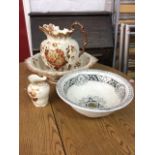 A Staffordshire jug & basin set with brushpot, having ripple moulded spatter gilt rims, decorated