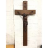 An oak crucifix, the cross mounted with carved figure of Christ. (32in)