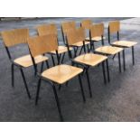 A set of eight dining chairs with plywood backs & seats on tubular metal frames. (8)