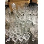 A quantity of glass including Edinburgh crystal, sets of drinking glasses, a decanter & stopper,