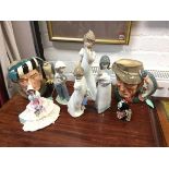 Four Nao Spanish porcelain children figurines; three Royal Doulton character jugs - The Falconer,