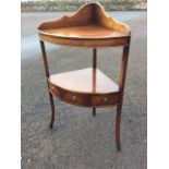 A nineteenth century style mahogany corner stand with shaped back above a bowfronted top supported