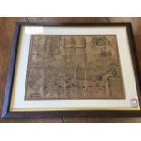 A map of Sussex after John Speede, the folded plate mounted and oak framed. (18in x 14in)