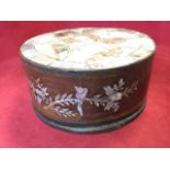 A circular nineteenth century Chinese box with brass rim mounts, the interior with divided tray, the