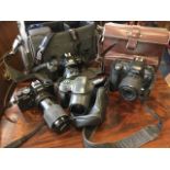 Five cameras - a cased Nikon F-401, a Fujifilm FinePix, a cased Prakica ML3 with spare lens, a Revue