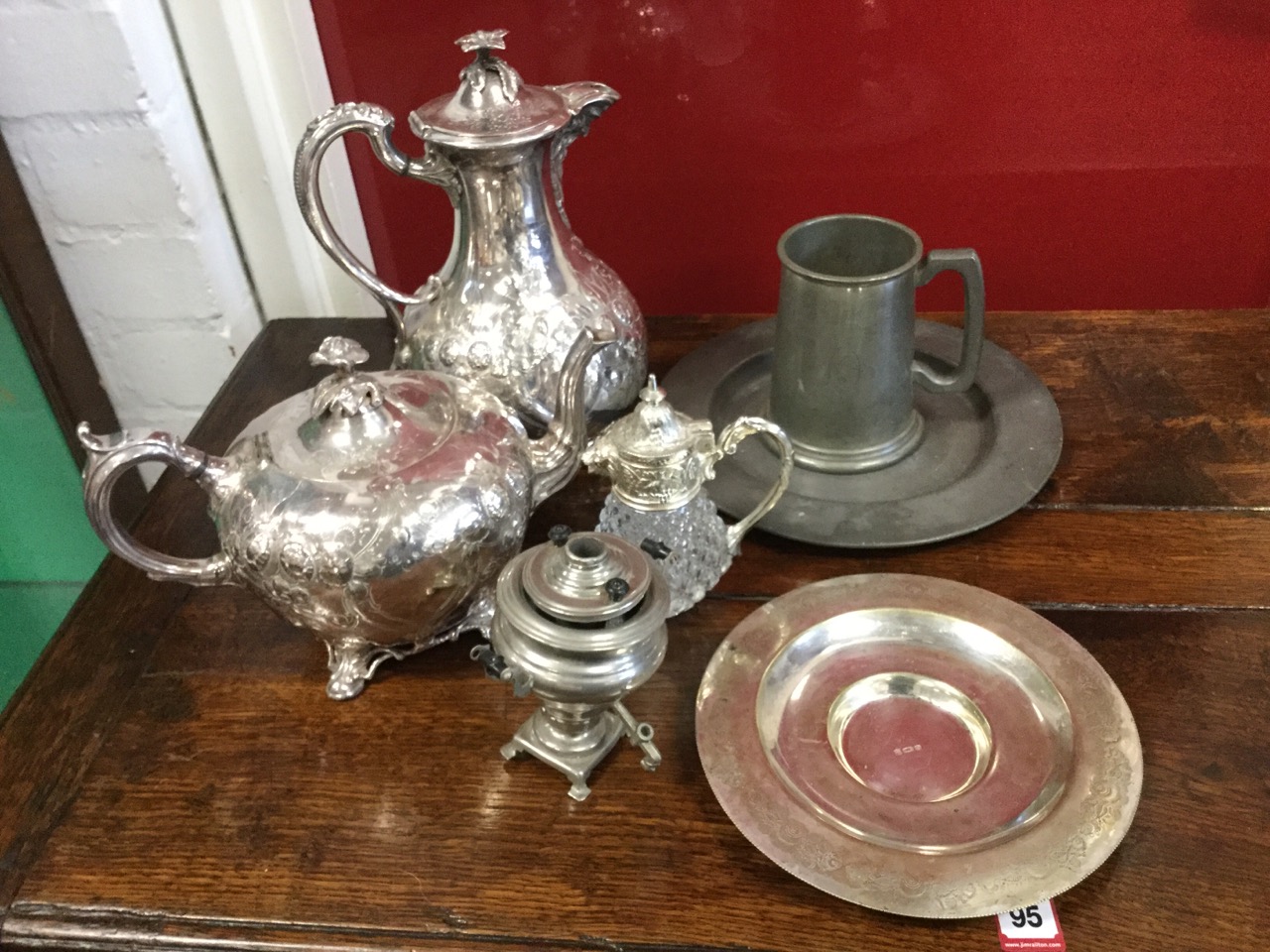 A Victorian Shaw & Fisher floral embossed tea & coffee pot, the hinged covers with flower finials;