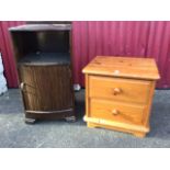 A modern pine dwarf chest with two knobbed drawers; and a bowfronted mahogany pot cupboard with open