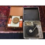 A cased portable Denon record player with Garrard deck; and a cased 60s four-piece picnic set with