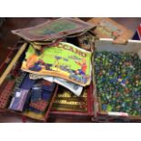 A boxed Meccano set with instructions - two trays of pieces; a box of glass marbles - several