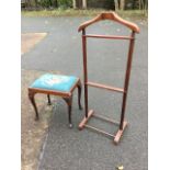 A rectangular mahogany dressing table stool with tapestry upholstered seat in moulded rails,