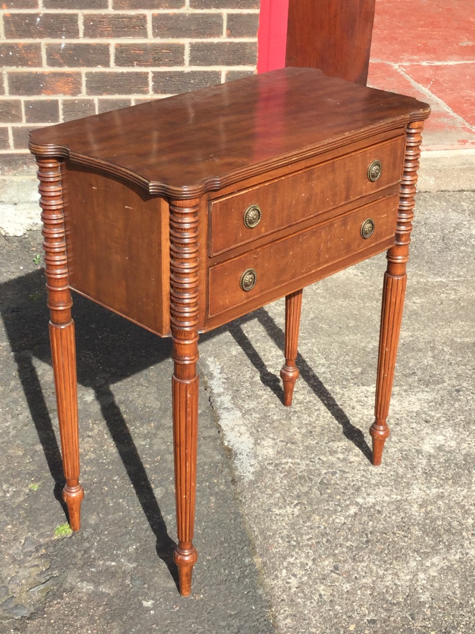 A mahogany side cabinet, the shaped top with ribbed edge above two cockbeaded drawers framed by - Image 3 of 3