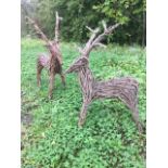A pair of stickwork deer. (26in x 41in) (2)