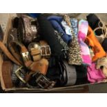 A box of ladies scarves, belts, gloves - some leather, some unused, silk, etc. (A lot)