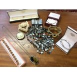 Miscellaneous jewellery including an amber silver bracelet, mother-of-pearl, a chrome wartime Doxa