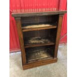 A Victorian rosewood open bookcase, the rectangular top above two adjustable open shelves