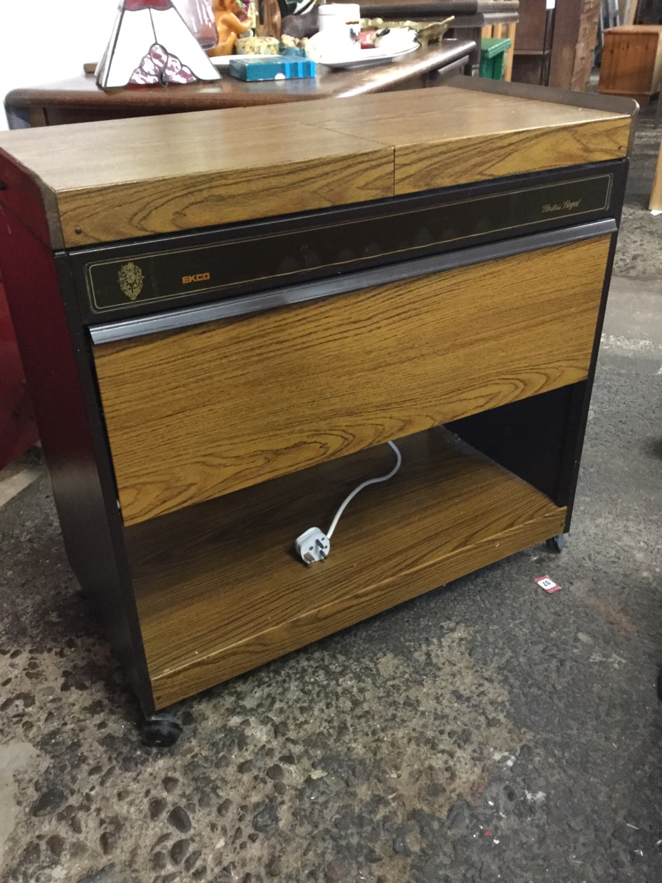 An electric Ecko hostess trolley, the twin sliding cover revealing tureens, having drop-down warming