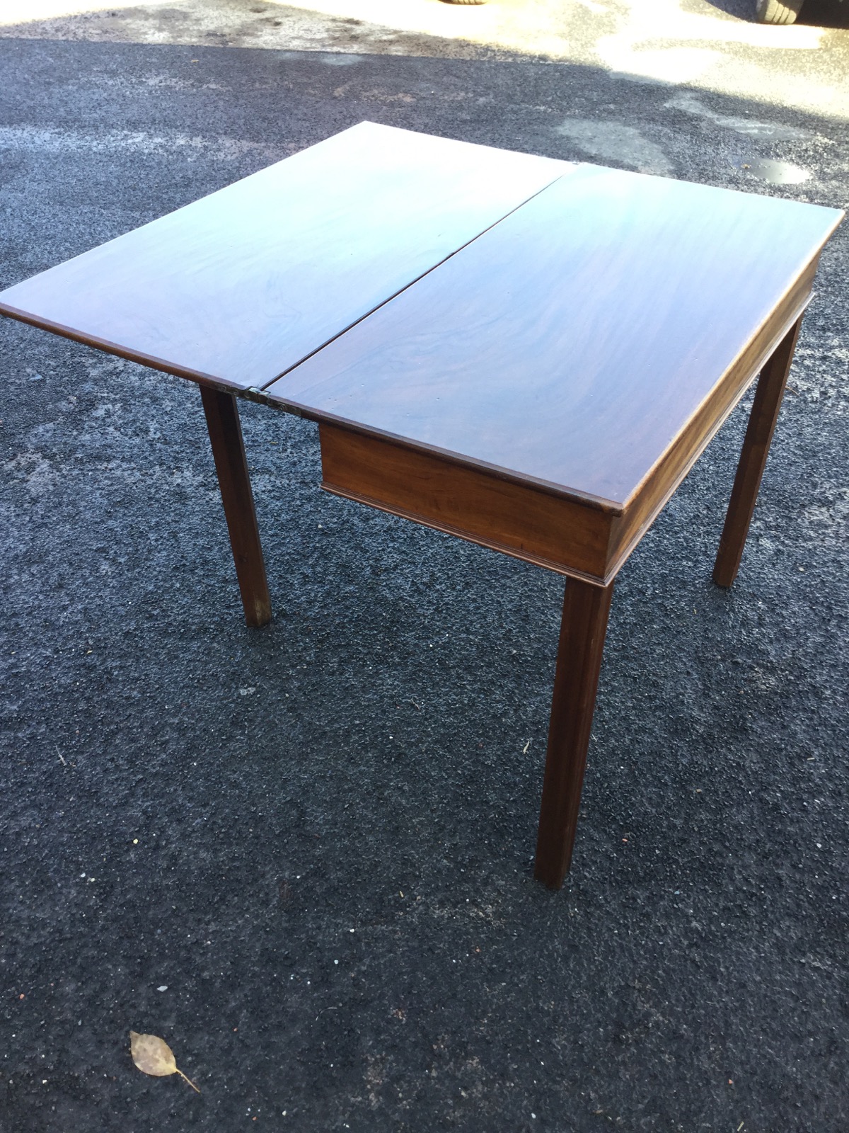 A nineteenth century mahogany turn-over-top tea table, the rectangular twin flaps above a plain - Image 3 of 3